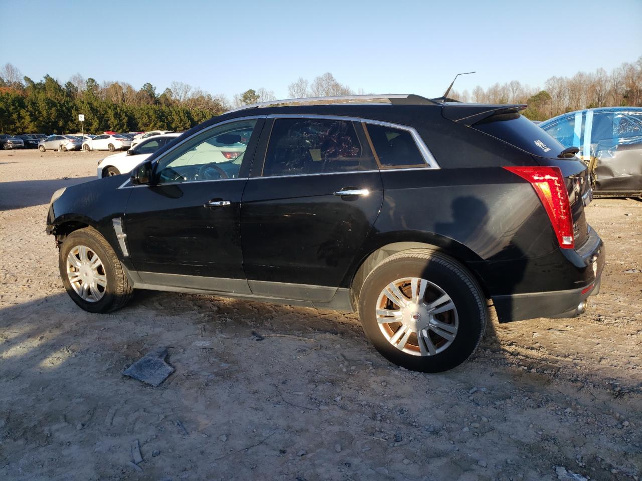 2012 Cadillac SRX VIN 3GYFNAE3XCS567697 Copart auction photo, front end damage thumbnail 2