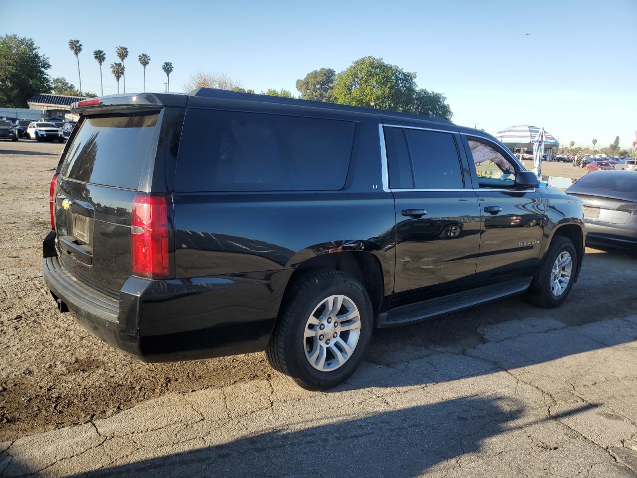 2020 Chevrolet Suburban VIN 1GNSCHKC9LR120568 Copart auction photo, side / rear end damage thumbnail 3