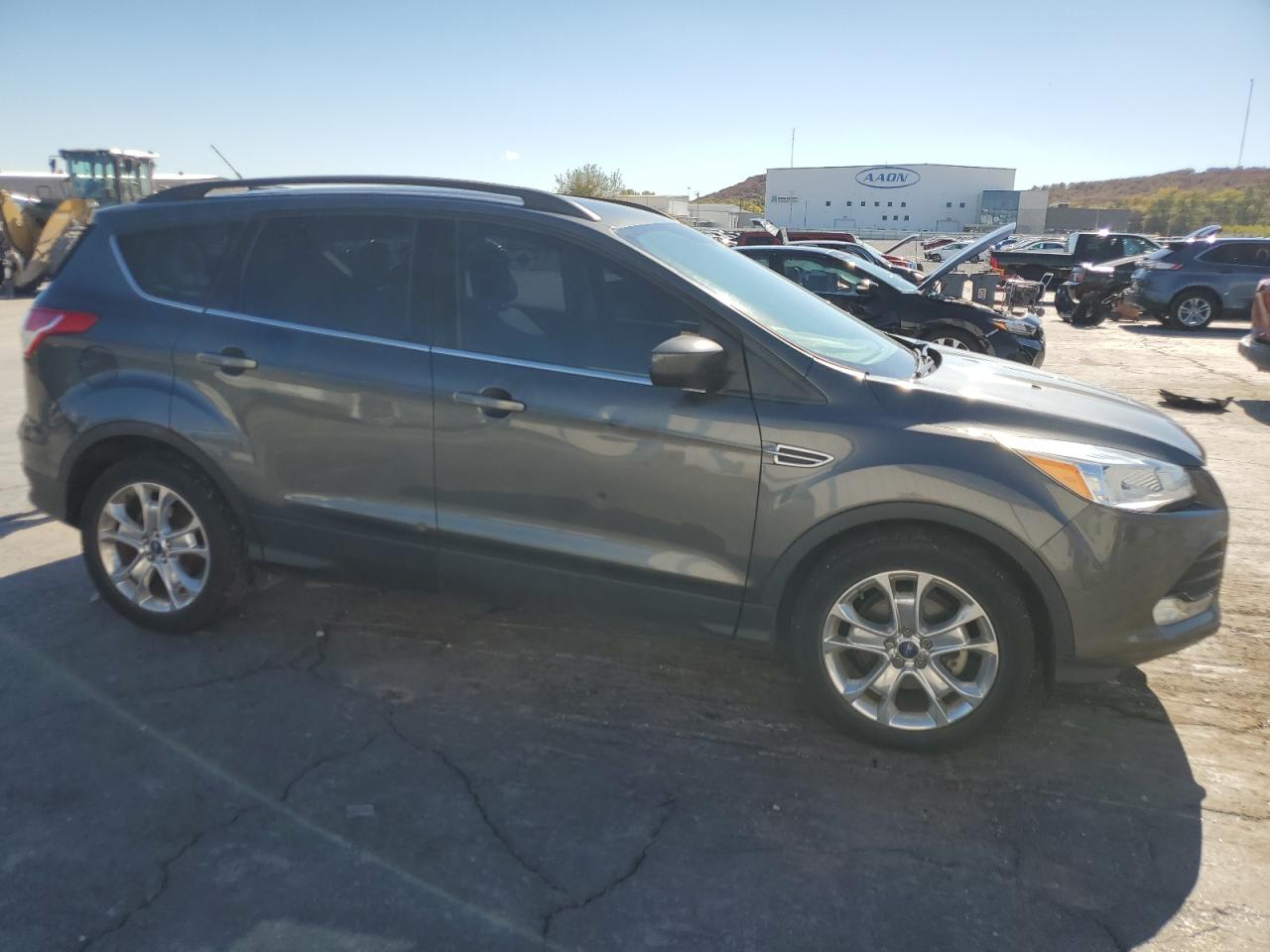 2016 Ford Escape VIN 1FMCU0GX3GUB96907 Copart auction photo, hail / side damage thumbnail 4