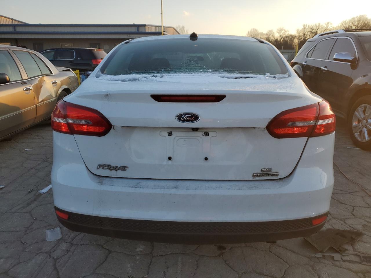 2015 Ford Focus VIN 1FADP3F26FL383219 Copart auction photo, all over damage thumbnail 6