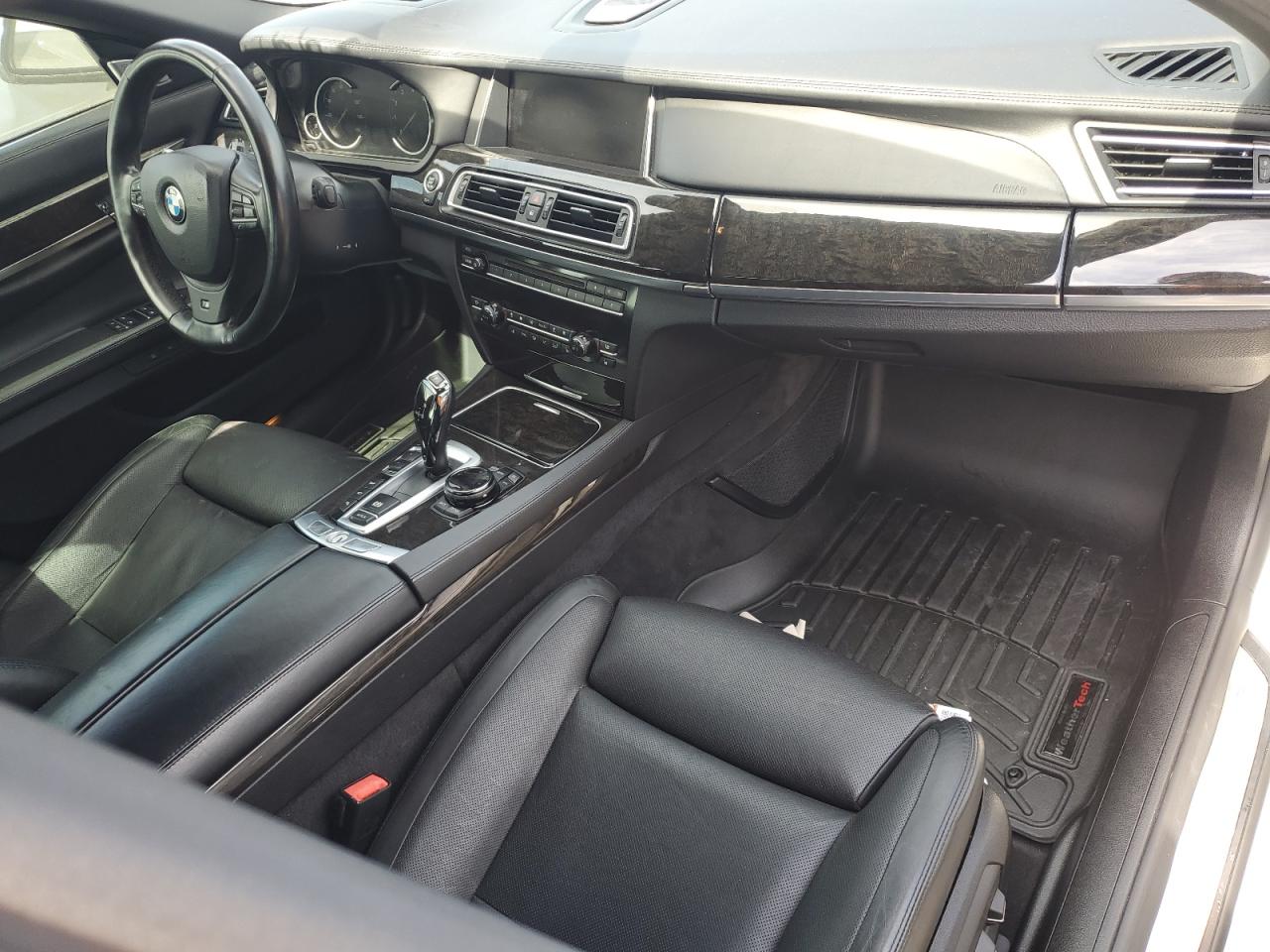 2015 BMW 7er VIN WBAYF8C5XFD654560 Copart auction photo, water/flood damage thumbnail 8