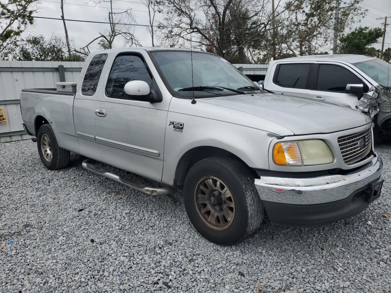 2003 Ford F-150 VIN 1FTRX17W13NA12992 Copart auction photo, front end damage thumbnail 4