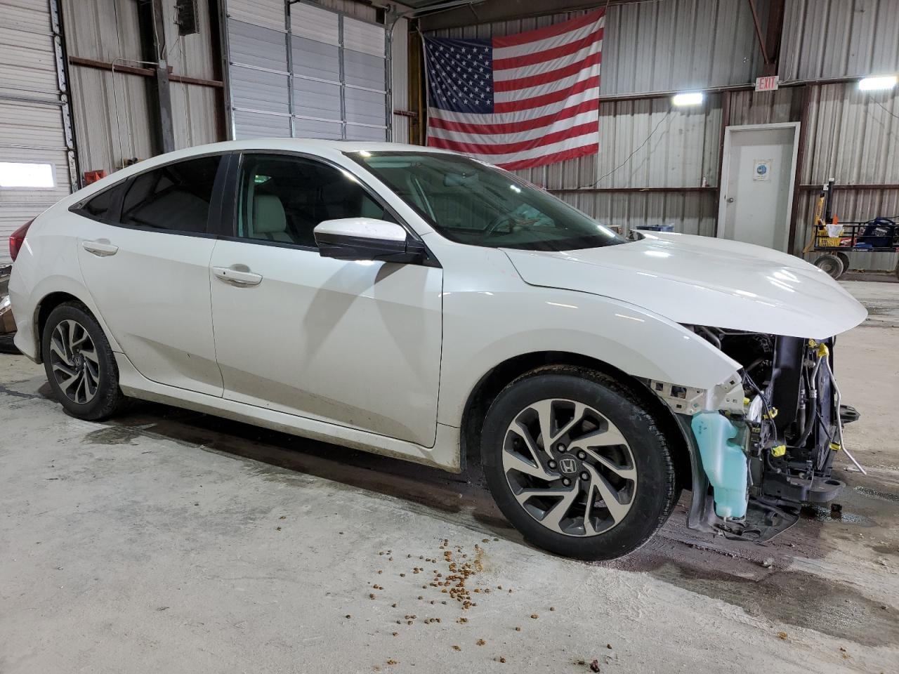 2017 Honda Civic VIN 19XFC2F79HE031042 Copart auction photo, front end / side damage thumbnail 4