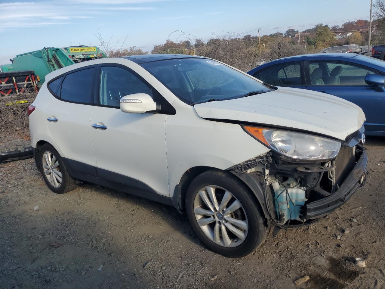 2012 Hyundai Tucson VIN KM8JUCAC0CU355018 Copart auction photo, front end / minor dent/scratches damage thumbnail 4