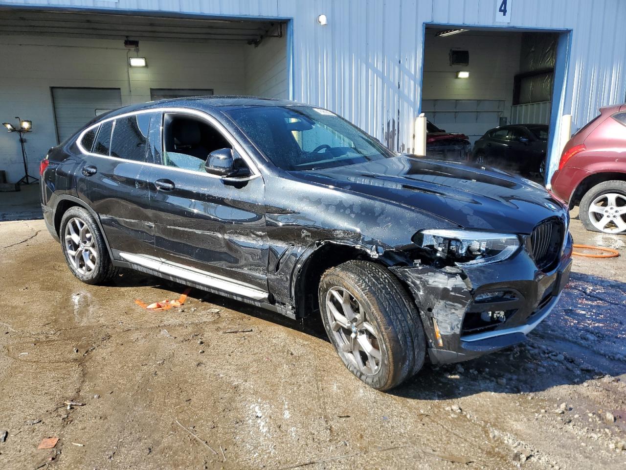 2021 BMW X4 VIN 5UX2V1C08M9E39879 Copart auction photo, front end / all over damage thumbnail 4