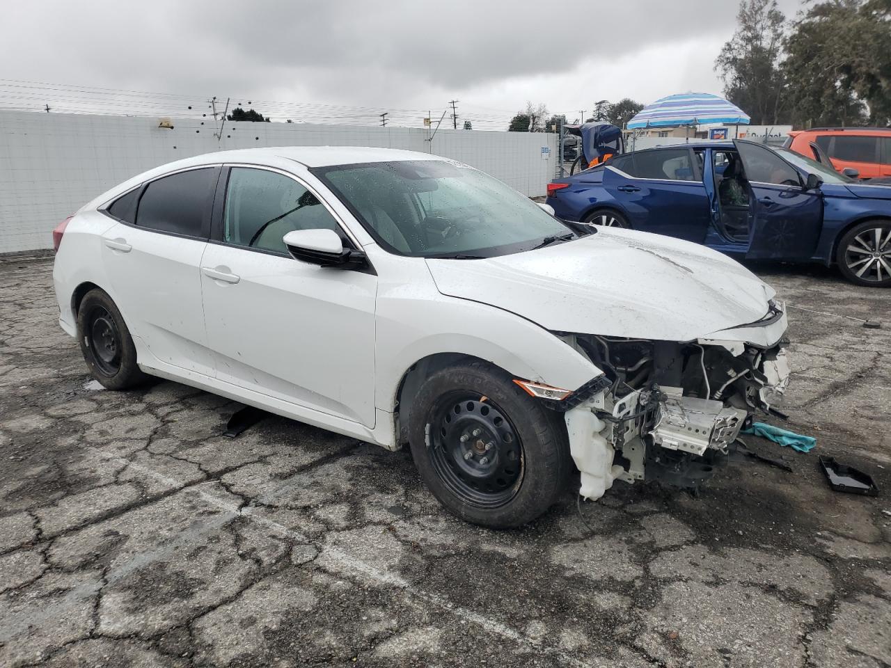 2019 Honda Civic VIN 2HGFC2F66KH606413 Copart auction photo, front end / rear end damage thumbnail 4