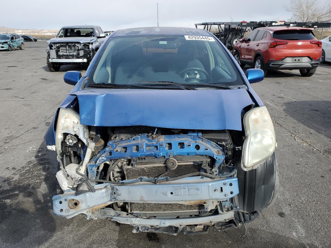 2011 Toyota Yaris VIN JTDKT4K38B5335821 Copart auction photo, front end damage thumbnail 5
