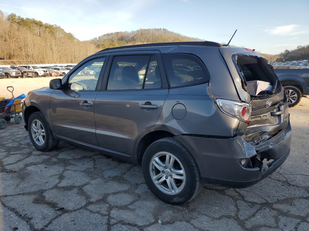2010 Hyundai Santa Fe VIN 5NMSGDAB2AH376745 Copart auction photo, front end / rear end damage thumbnail 2