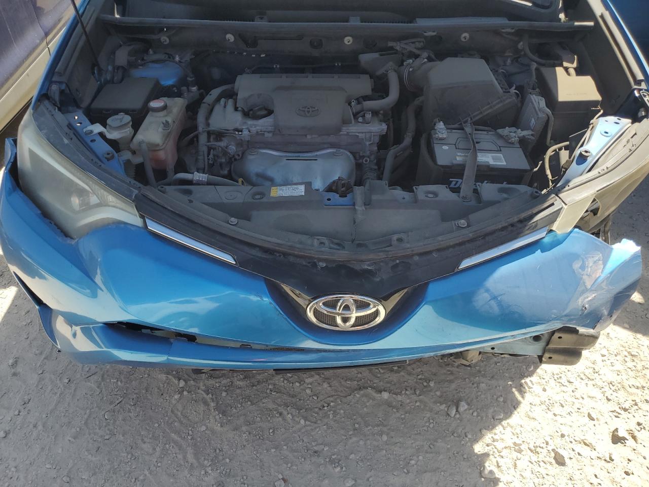 2016 Toyota RAV 4 VIN JTMZFREV9GJ077971 Copart auction photo, front end / minor dent/scratches damage thumbnail 12