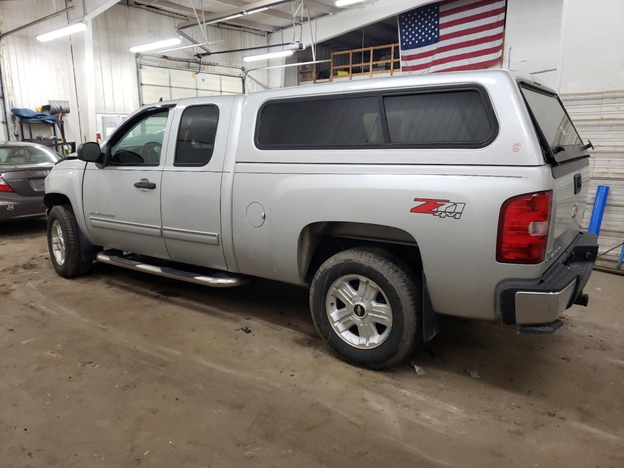 2011 Chevrolet Silverado VIN 1GCRKSE32BZ423127 Copart auction photo, front end / side damage thumbnail 2