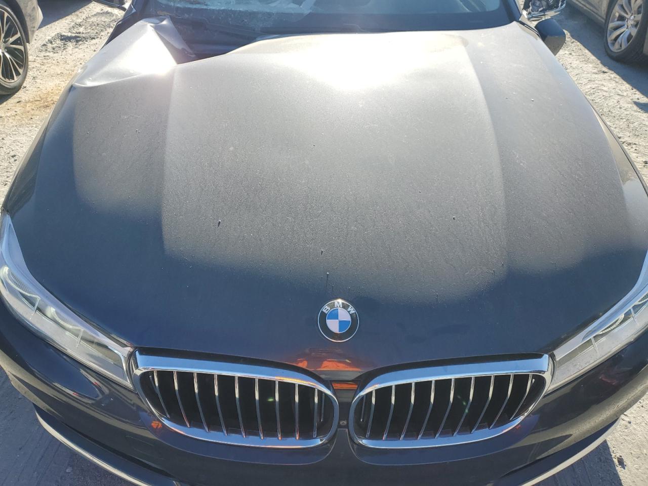 2019 BMW 7er VIN WBA7F2C55KB240777 Copart auction photo, top/roof damage thumbnail 3