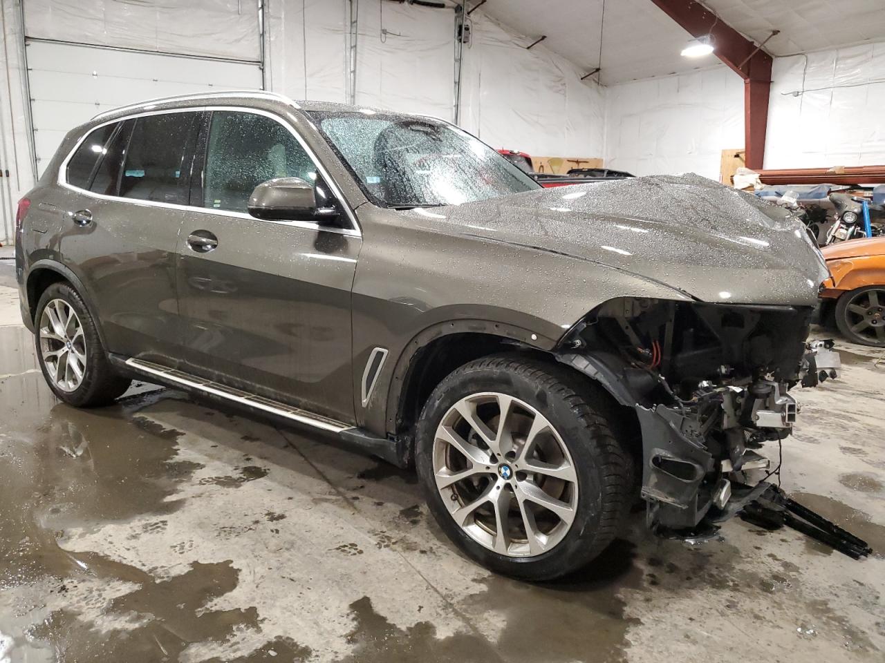 2020 BMW X5 VIN 5UXCR6C05L9B73094 Copart auction photo, front end / minor dent/scratches damage thumbnail 4