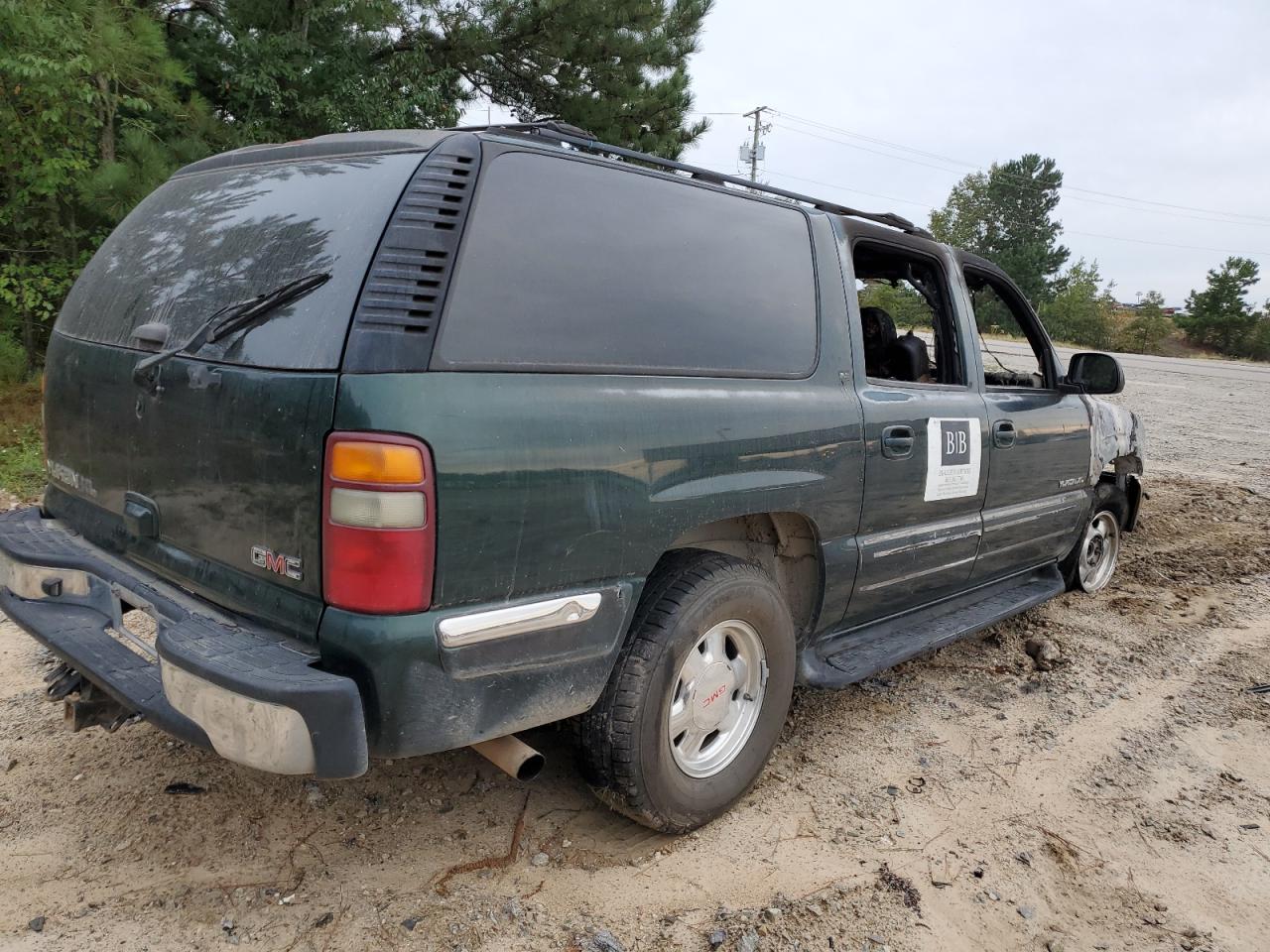 2002 GMC Yukon VIN 1GKEC16Z72J191913 Copart auction photo, burn damage thumbnail 3
