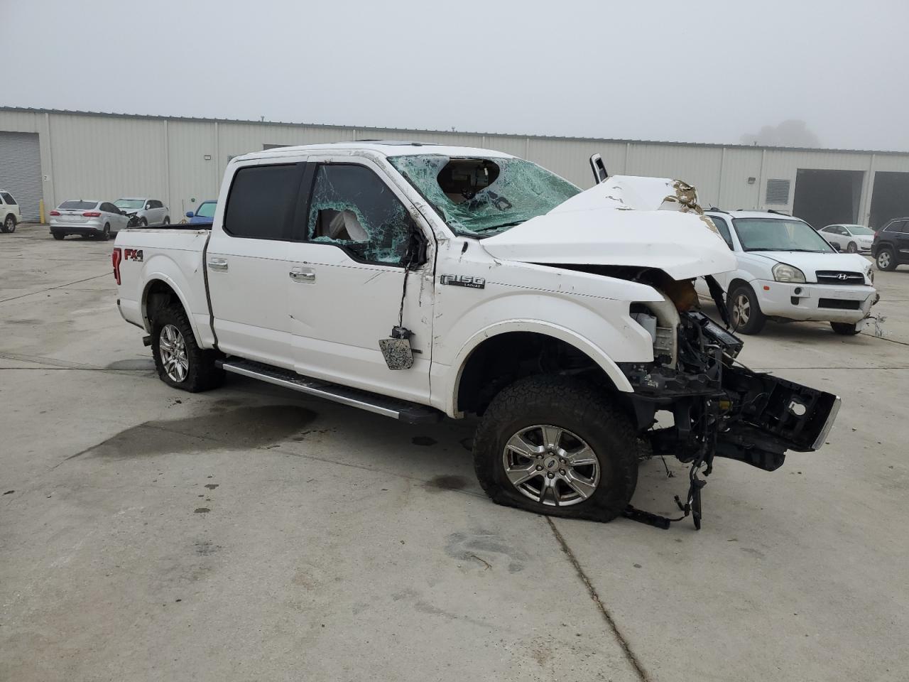 2015 Ford F-150 VIN 1FTEW1EG4FKE12855 Copart auction photo, front end / rollover damage thumbnail 4