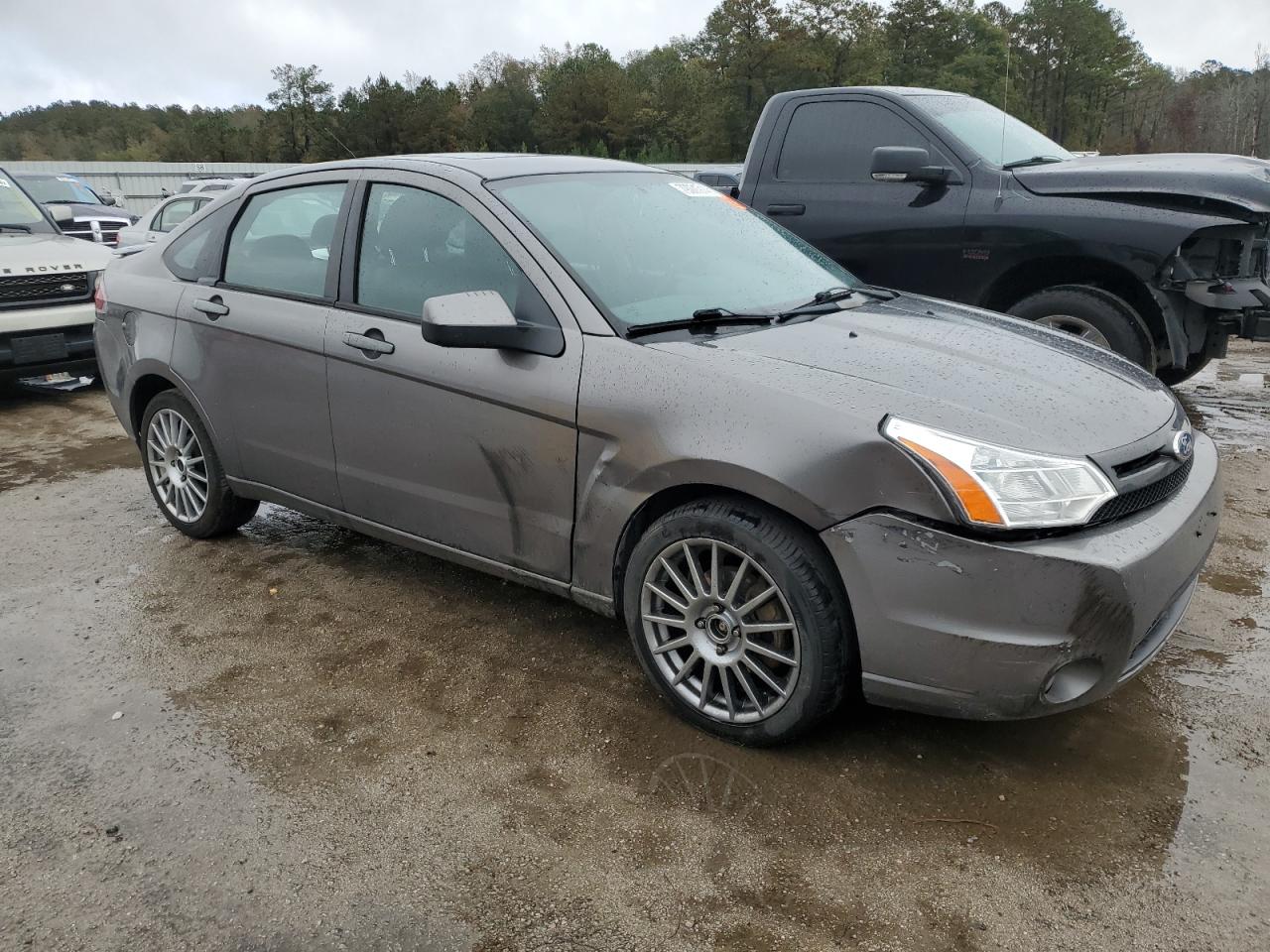 2011 Ford Focus VIN 1FAHP3GN2BW165569 Copart auction photo, front end / rear end damage thumbnail 4