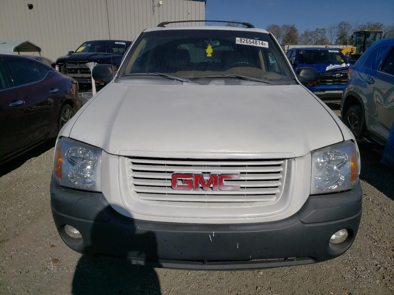 2003 GMC Envoy VIN 1GKDS13SX32242421 Copart auction photo, minor dent/scratches damage thumbnail 5