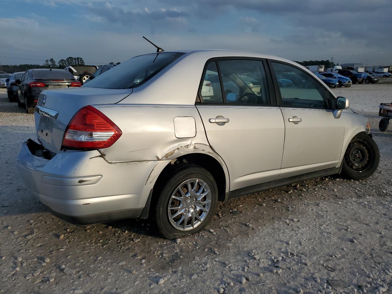 2009 Nissan Versa VIN 3N1BC11E69L494335 Copart auction photo, all over / undercarriage damage thumbnail 3