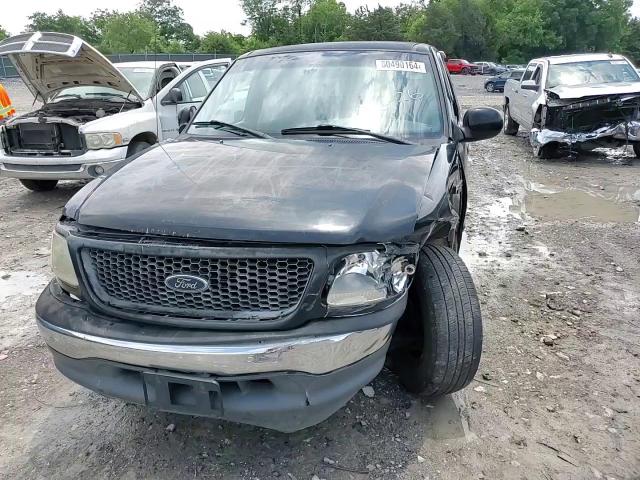 2000 Ford F-150 VIN 1FTZX1720YNB83091 Copart auction photo, front end / side damage thumbnail 10