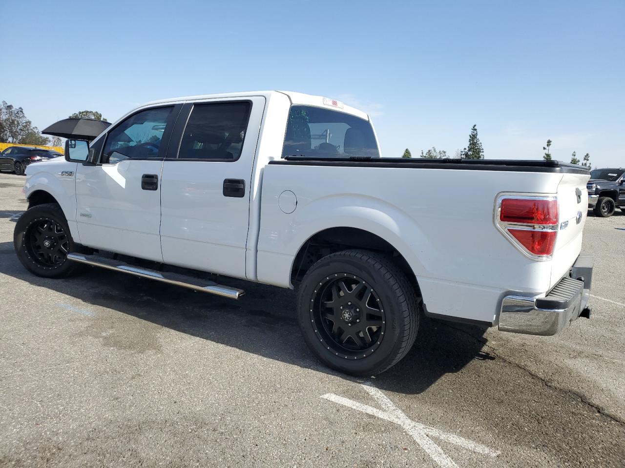 2014 Ford F-150 VIN 1FTFW1CT1EFA32173 Copart auction photo, side / front end damage thumbnail 2