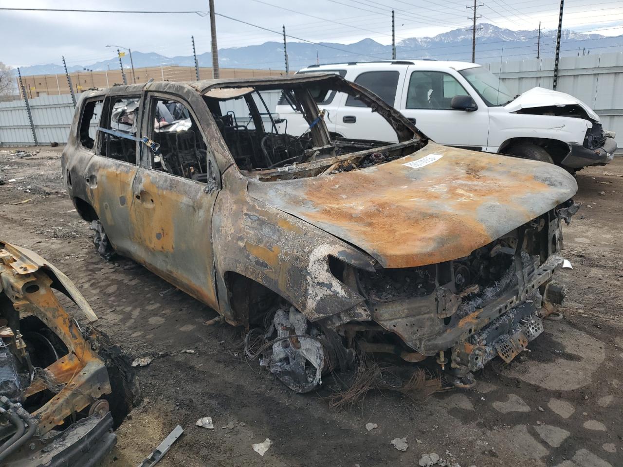 2011 Toyota Land Cruiser VIN JTMHY7AJ3B4007368 Copart auction photo, burn damage thumbnail 4