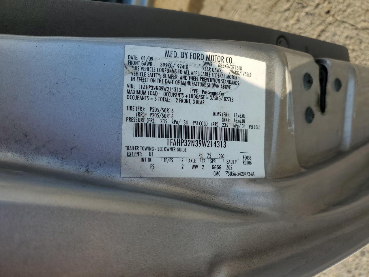 2009 Ford Focus VIN 1FAHP32N39W214313 Copart auction photo, rear end / side damage thumbnail 12