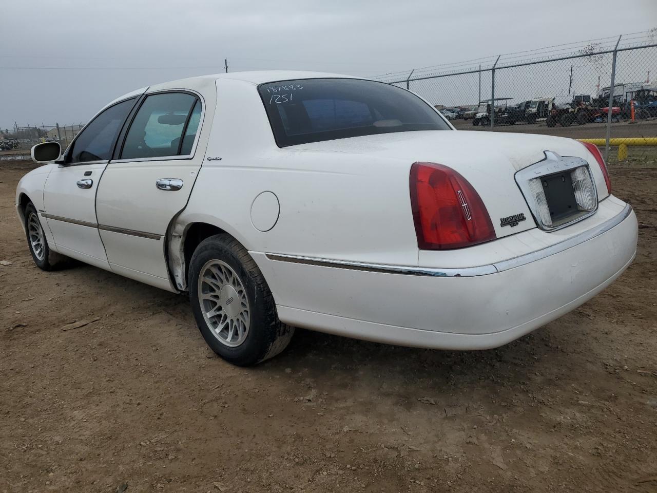 2001 Lincoln Town Car VIN 1LNHM82W41Y738339 Copart auction photo, side / rear end damage thumbnail 2