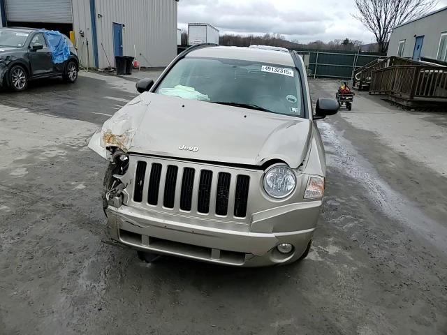 2010 Jeep Compass VIN 1J4NF1FB5AD623461 Copart auction photo, front end damage thumbnail 12