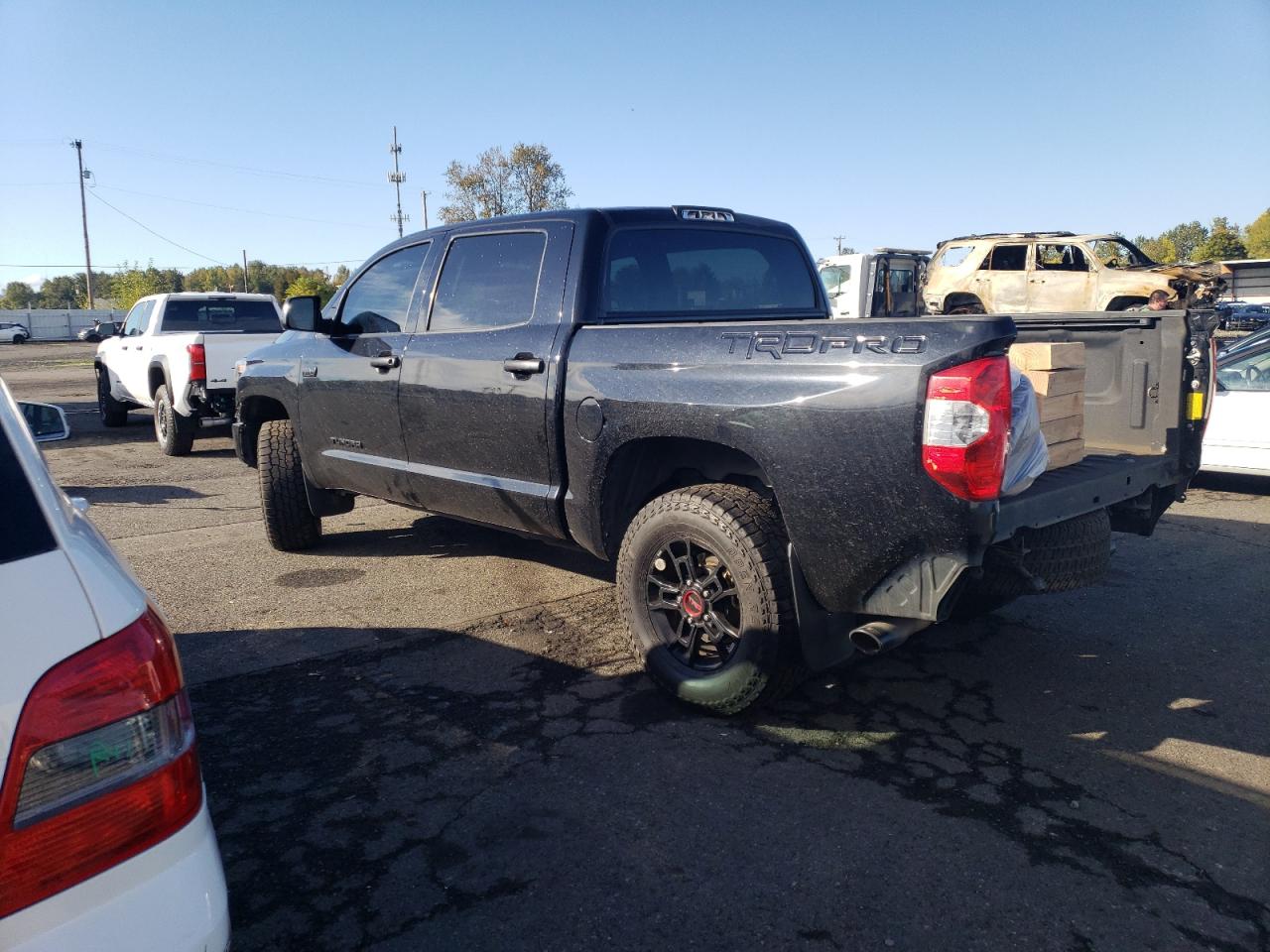 2019 Toyota Tundra VIN 5TFDY5F15KX868660 Copart auction photo, all over damage thumbnail 2