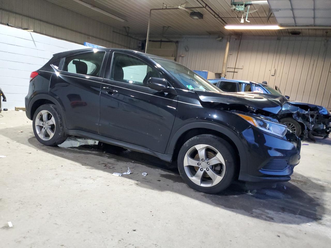 2020 Honda HR-V VIN 3CZRU6H39LM712533 Copart auction photo, front end / minor dent/scratches damage thumbnail 4