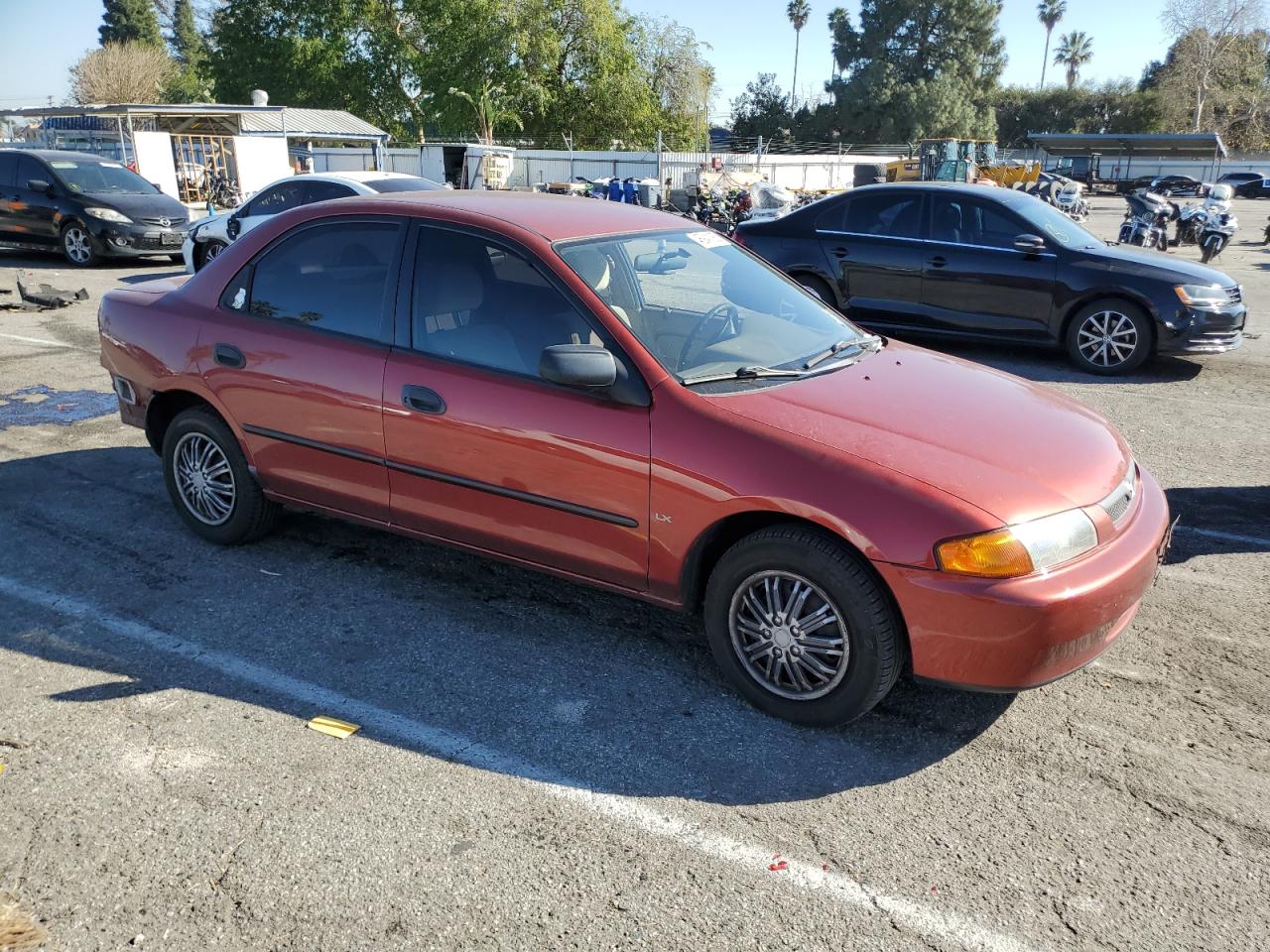 1998 Mazda Protege VIN JM1BC1411W0198007 Copart auction photo, rear end / minor dent/scratches damage thumbnail 4