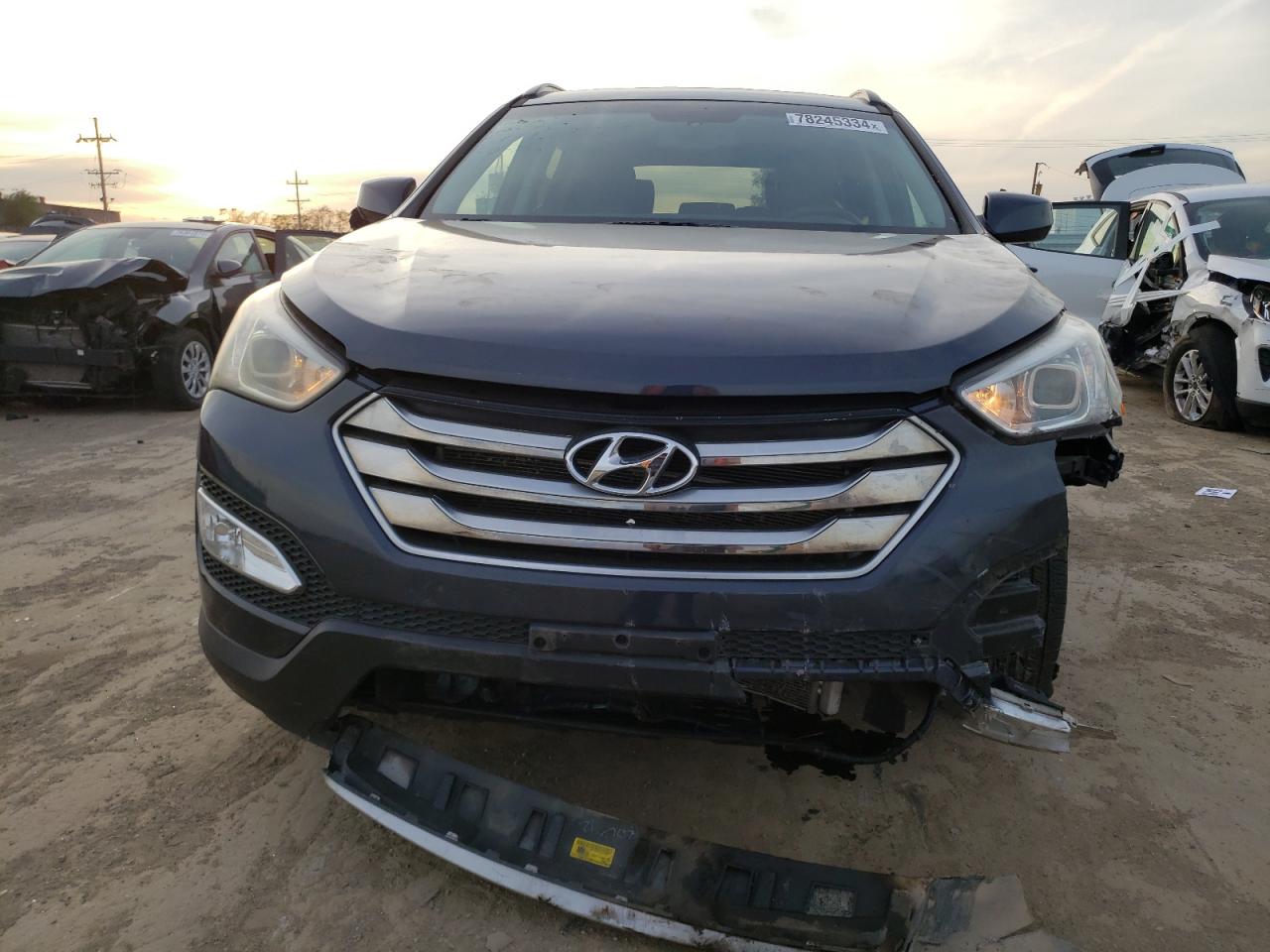 2015 Hyundai Santa Fe VIN 5XYZU3LB4FG255229 Copart auction photo, front end / side damage thumbnail 5