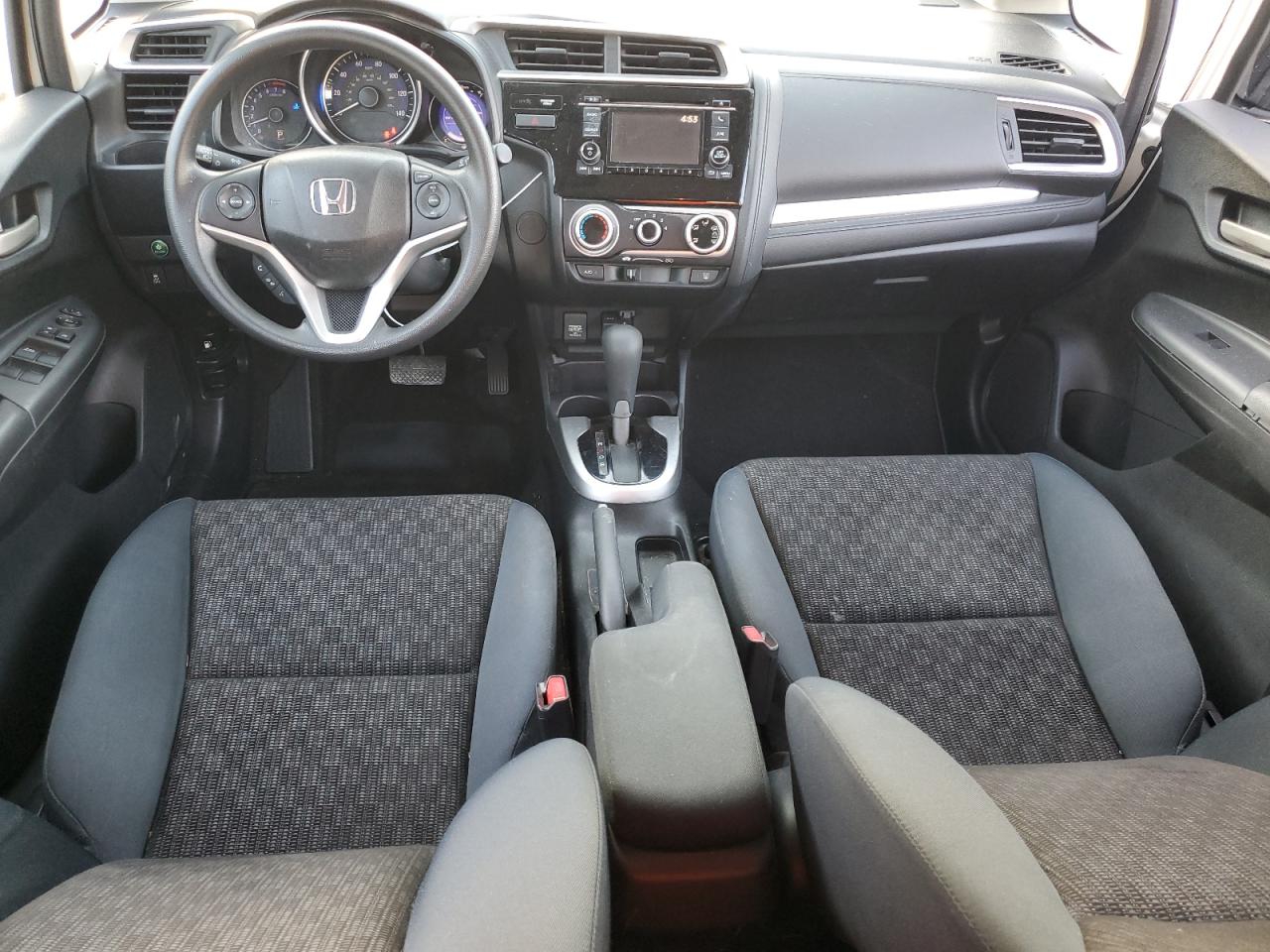 2016 Honda Fit VIN JHMGK5H51GS006909 Copart auction photo, side / front end damage thumbnail 8