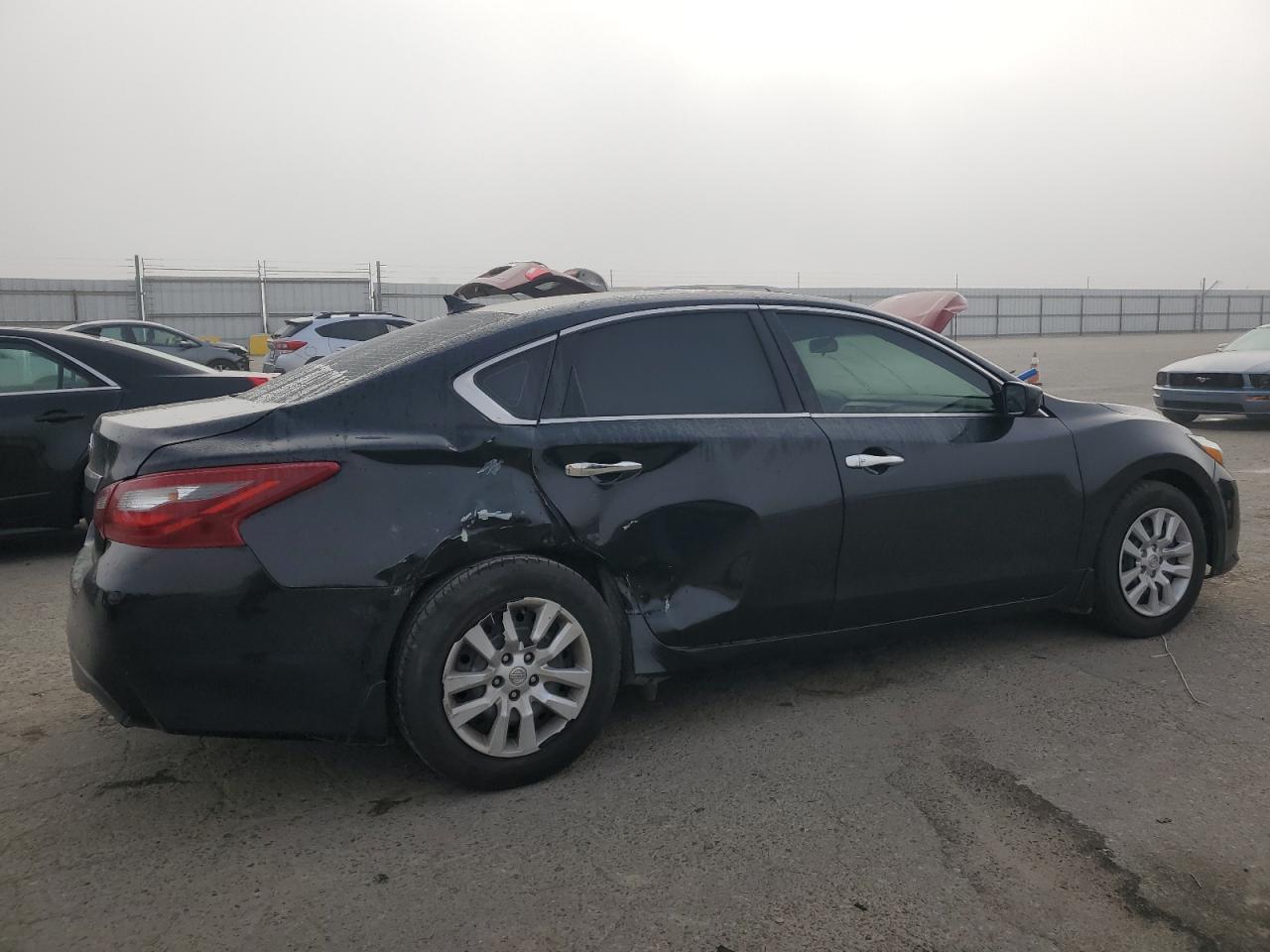 2018 Nissan Altima VIN 1N4AL3AP1JC257392 Copart auction photo, side / rear end damage thumbnail 3