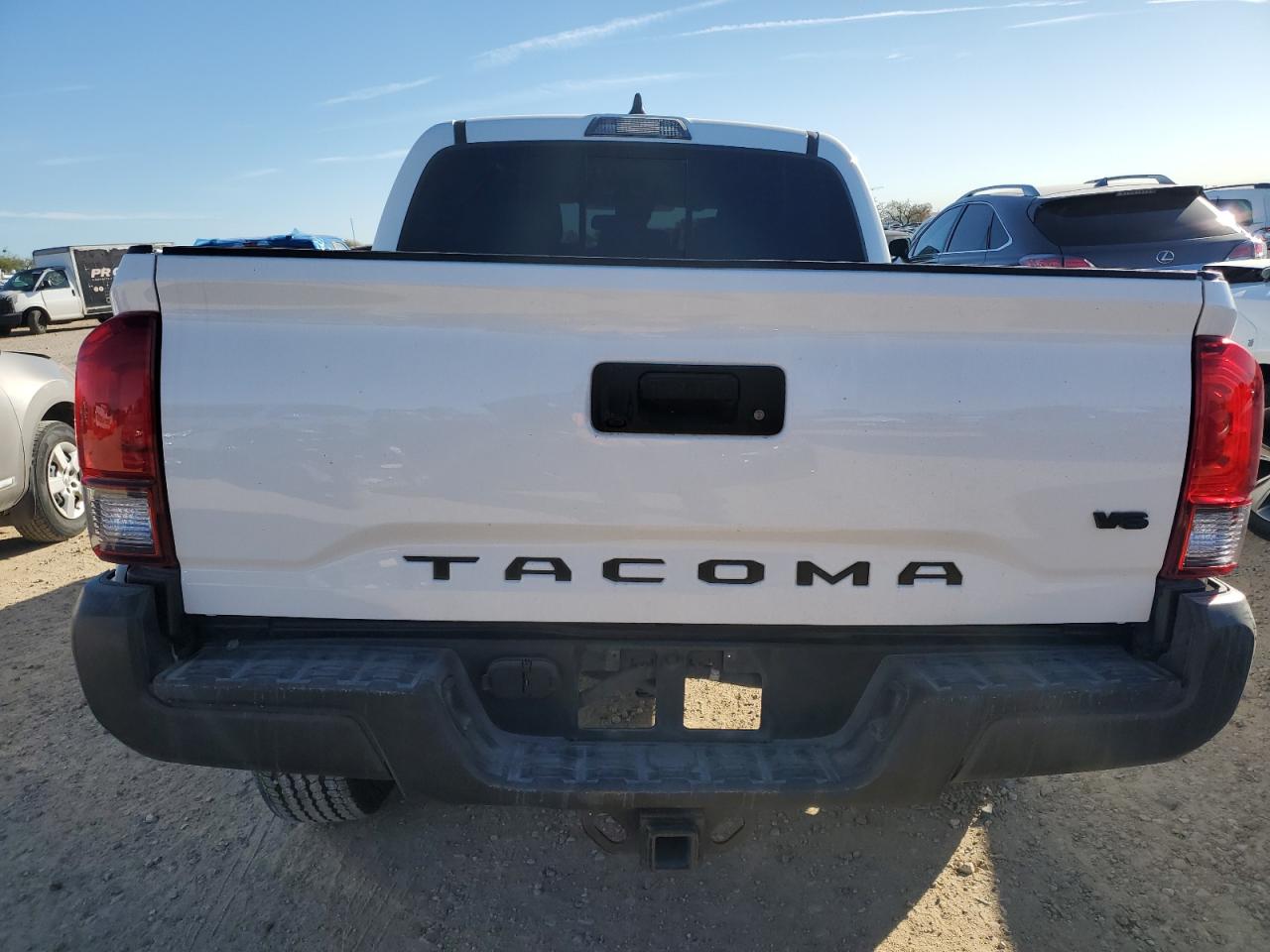 2021 Toyota Tacoma VIN 5TFAZ5CN7MX102830 Copart auction photo, side / undercarriage damage thumbnail 6