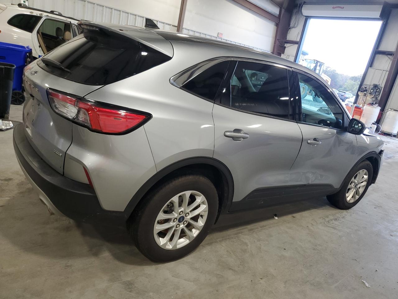 2021 Ford Escape VIN 1FMCU0BZ3MUB14128 Copart auction photo, side / minor dent/scratches damage thumbnail 3