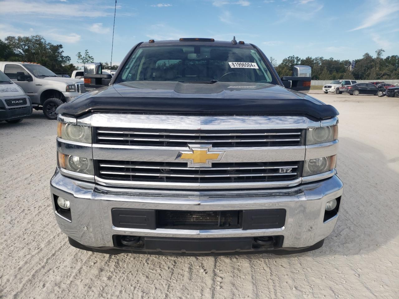 2015 Chevrolet Silverado VIN 1GC4C0C82FF561686 Copart auction photo, undercarriage / minor dent/scratches damage thumbnail 5