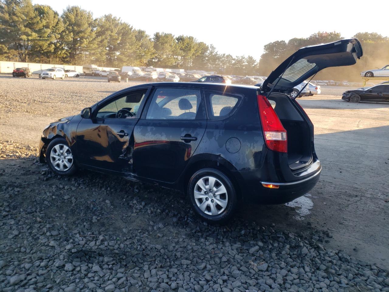 2012 Hyundai Elantra VIN KMHDB8AE5CU152143 Copart auction photo, all over damage thumbnail 2