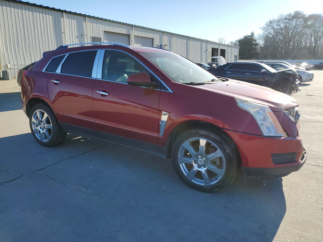 2011 Cadillac SRX VIN 3GYFNAEY7BS558174 Copart auction photo, front end damage thumbnail 4