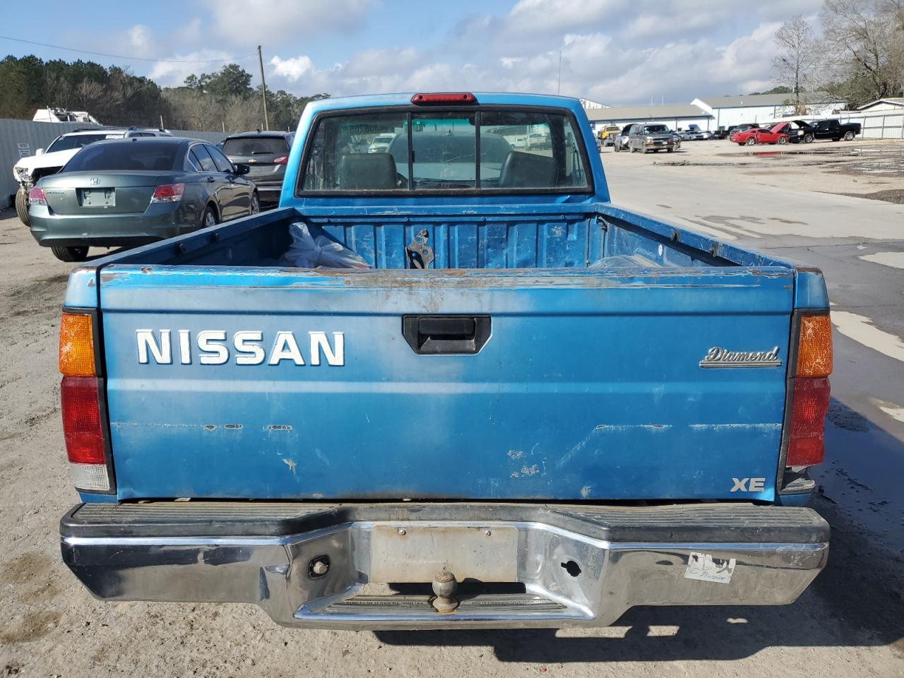 1995 Nissan Navara (Frontier) VIN 1N6SD11S4SC395012 Copart auction photo, front end / side damage thumbnail 6