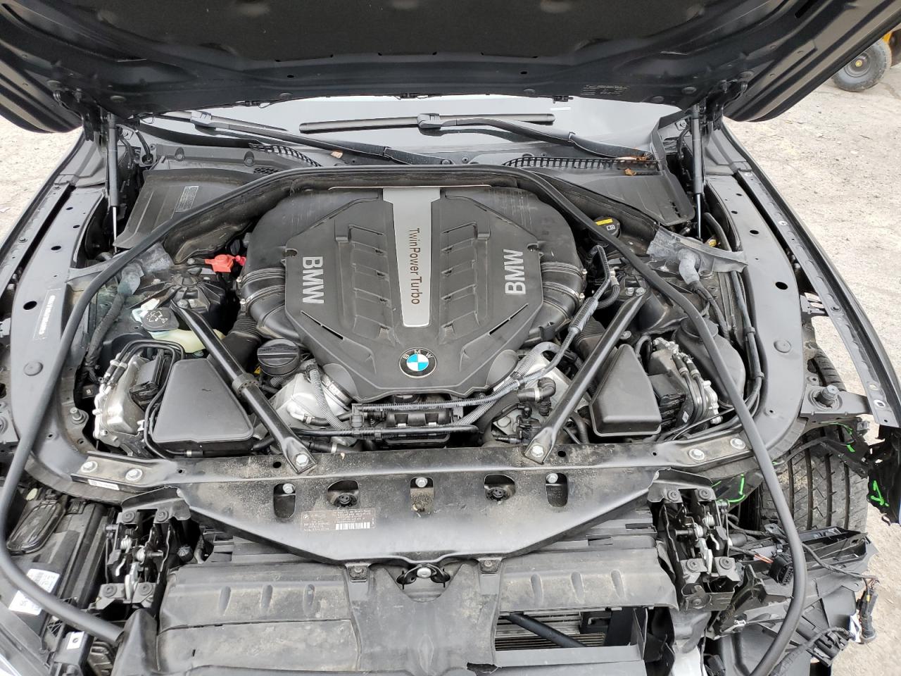 2015 BMW 7er VIN WBAYF8C54FD654795 Copart auction photo, front end / side damage thumbnail 11