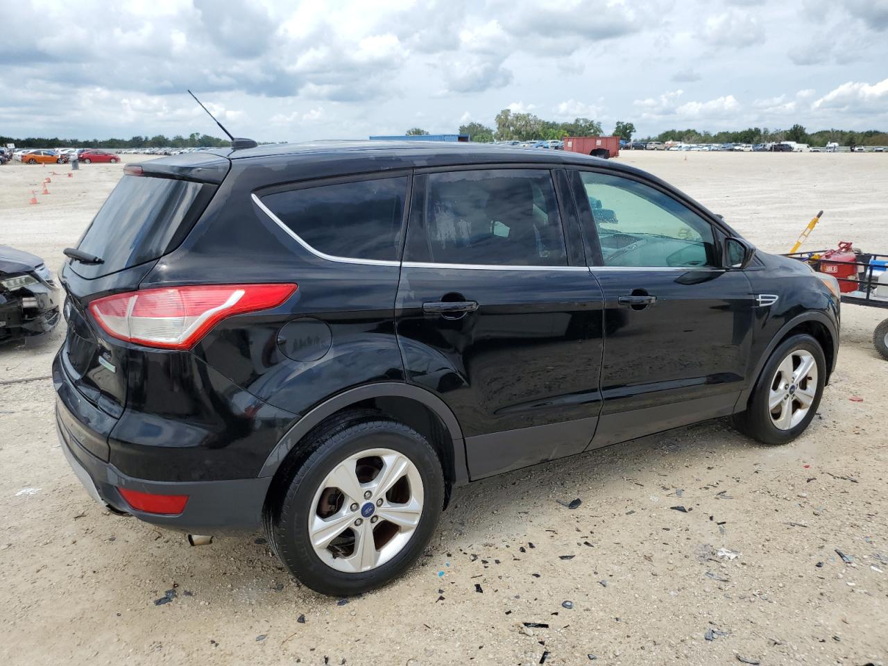 2016 Ford Escape VIN 1FMCU0G96GUA28244 Copart auction photo, rear end / minor dent/scratches damage thumbnail 3