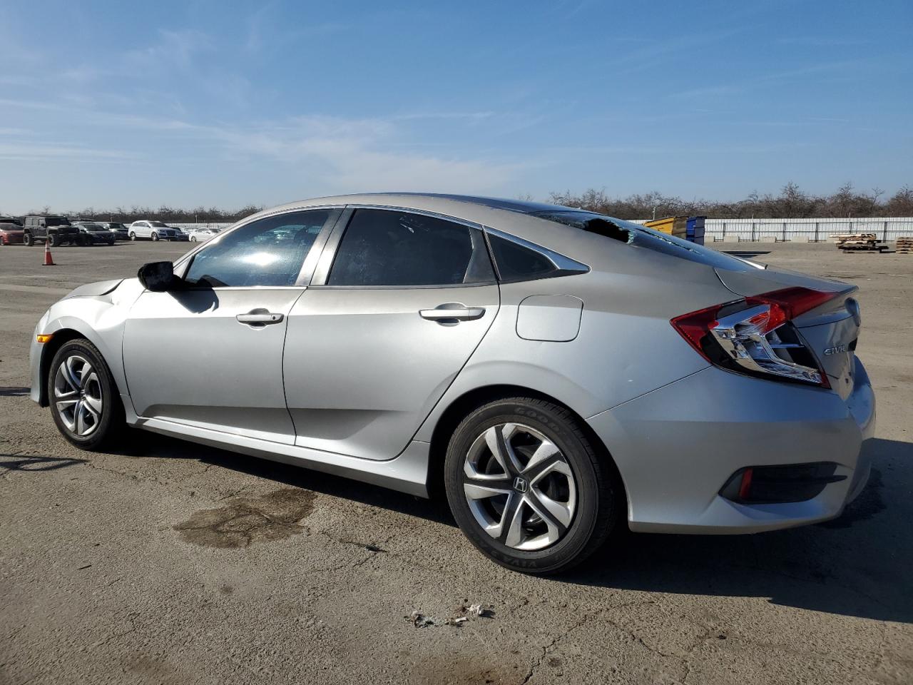 2016 Honda Civic VIN 2HGFC2F54GH554410 Copart auction photo, vandalism damage thumbnail 2