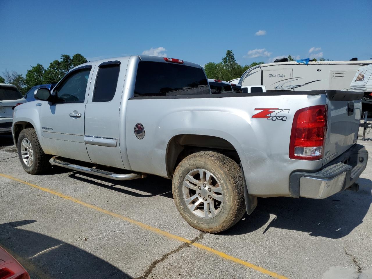 2011 GMC Sierra VIN 1GTR2VE30BZ179222 Copart auction photo, hail / rear end damage thumbnail 2