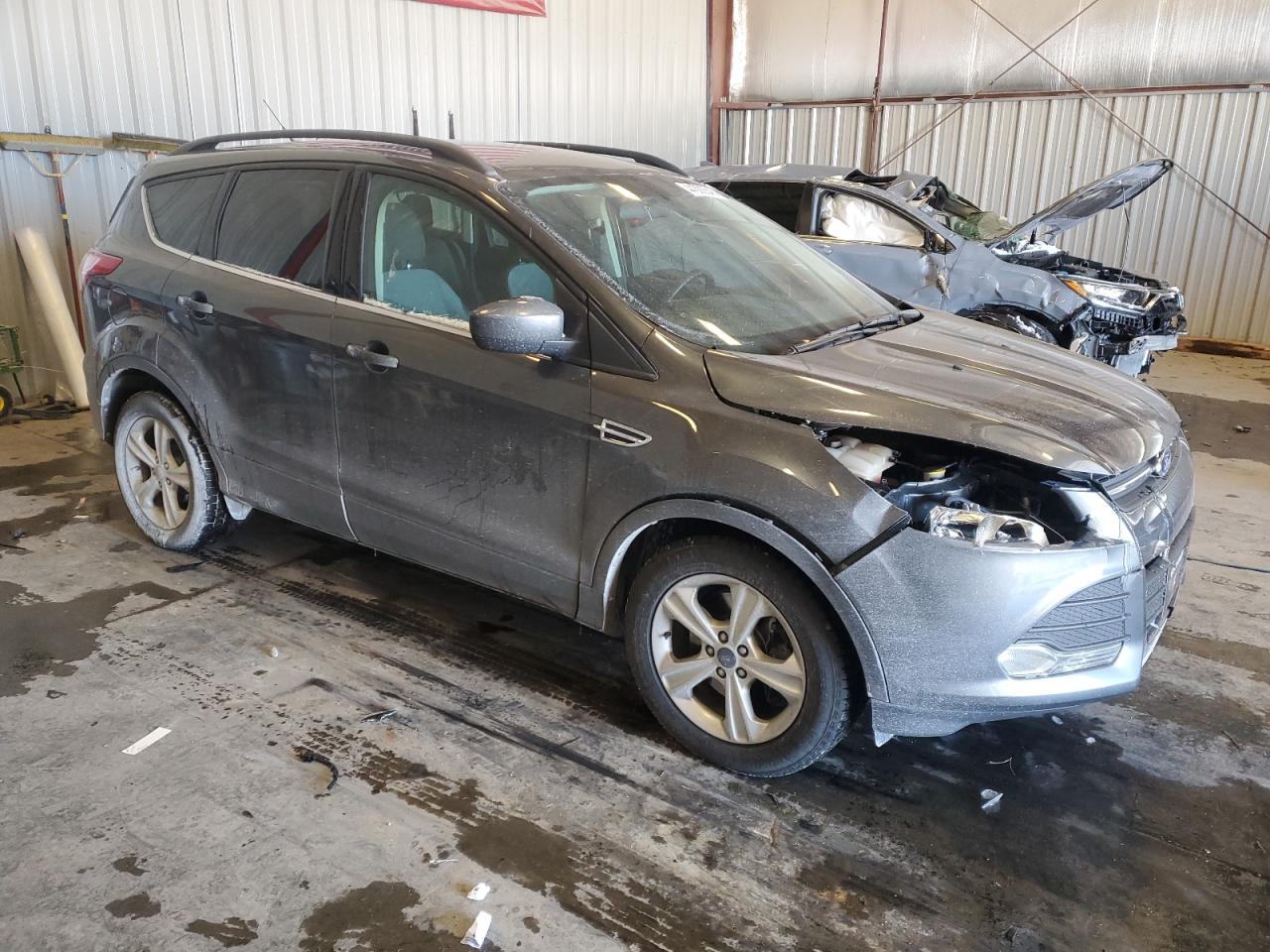 2015 Ford Escape VIN 1FMCU9GX0FUB16899 Copart auction photo, front end damage thumbnail 4