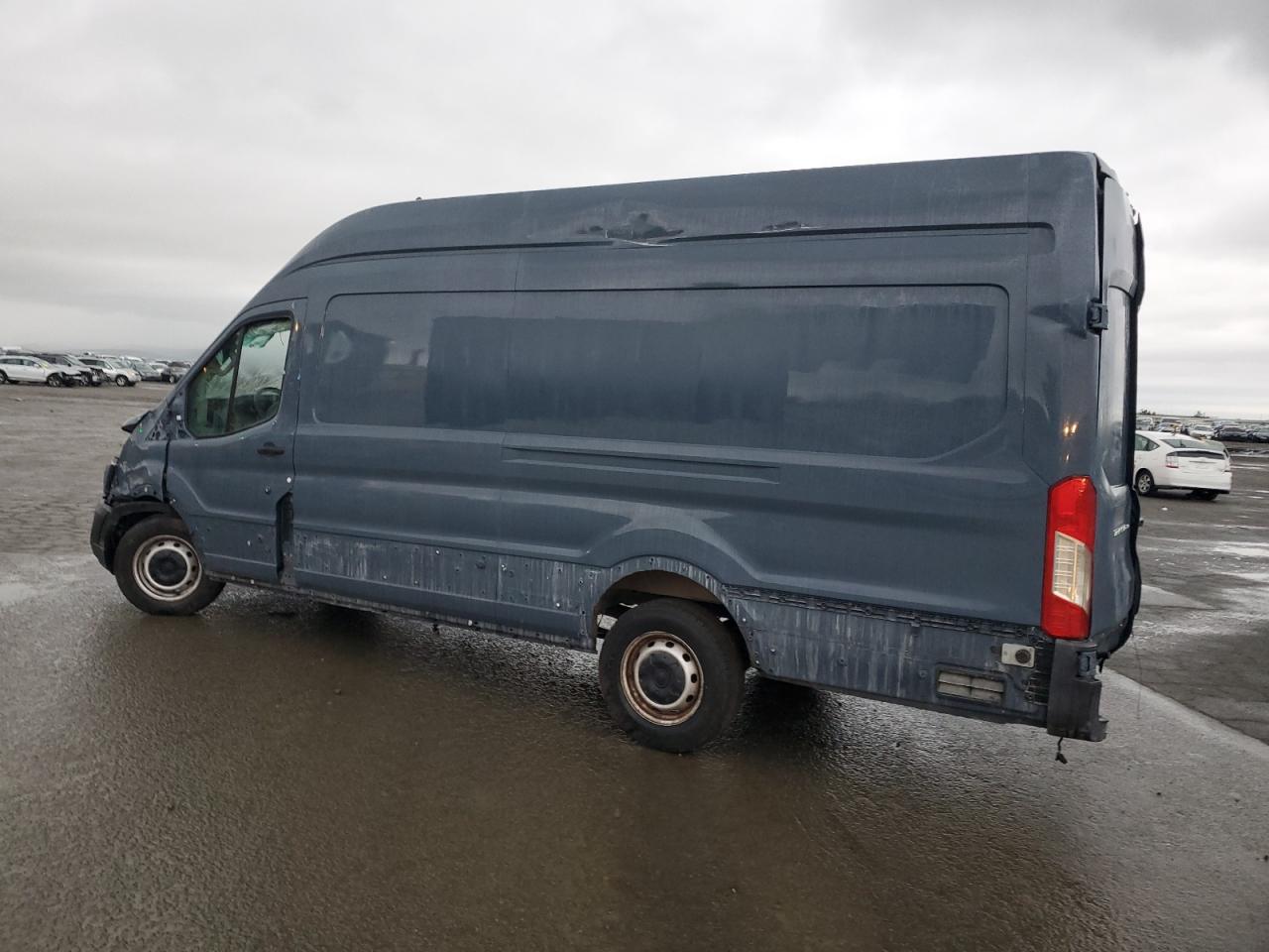 2021 Ford Transit VIN 1FTBR3X86MKA45529 Copart auction photo, rollover damage thumbnail 2