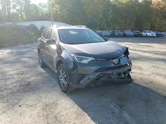 2018 Toyota RAV 4 VIN 2T3BFREV6JW835355 Copart auction photo, front end / minor dent/scratches damage thumbnail 11