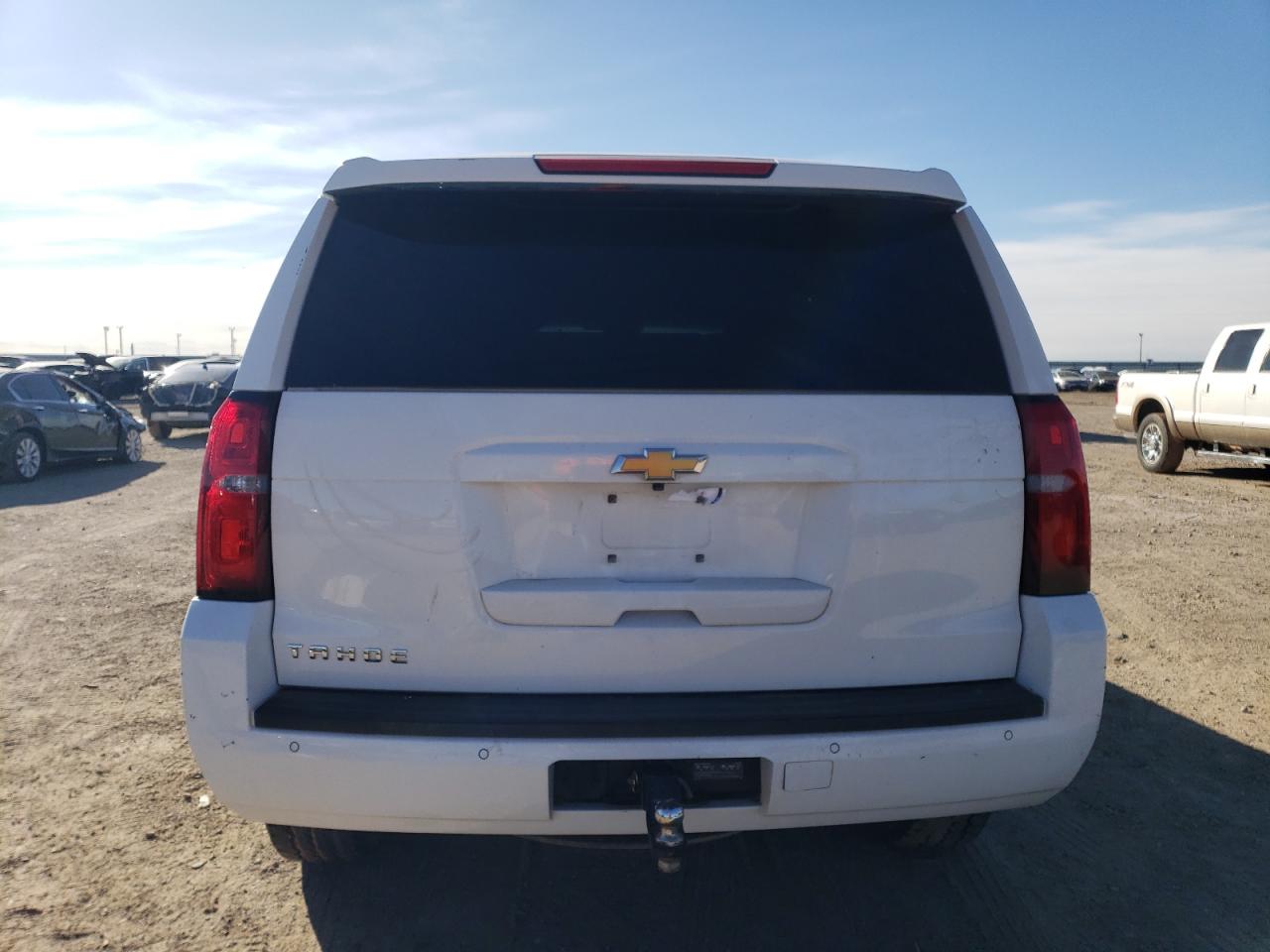 2015 Chevrolet Tahoe VIN 1GNSCBKC8FR169200 Copart auction photo, side / front end damage thumbnail 6