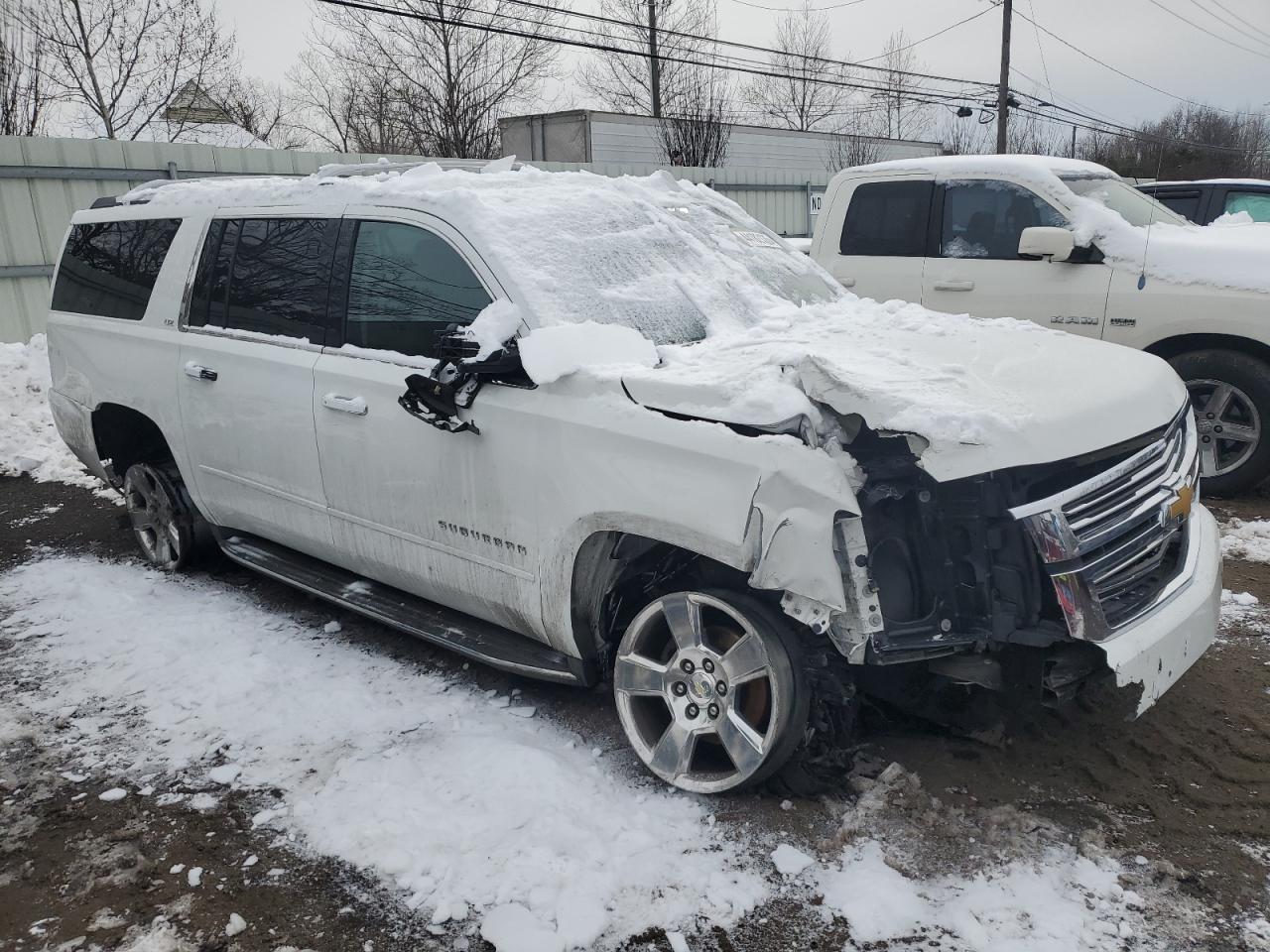 2016 Chevrolet Suburban VIN 1GNSKJKC8GR202355 Copart auction photo, front end / undercarriage damage thumbnail 4