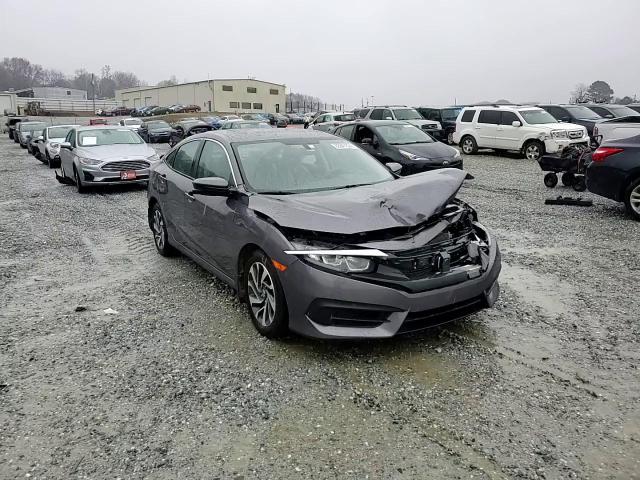 2017 Honda Civic VIN 19XFC2F7XHE055429 Copart auction photo, front end / minor dent/scratches damage thumbnail 11