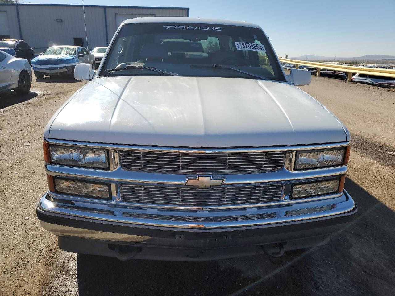 1997 Chevrolet Tahoe VIN 1GNEK13R2VJ325435 Copart auction photo, vandalism / minor dent/scratches damage thumbnail 5